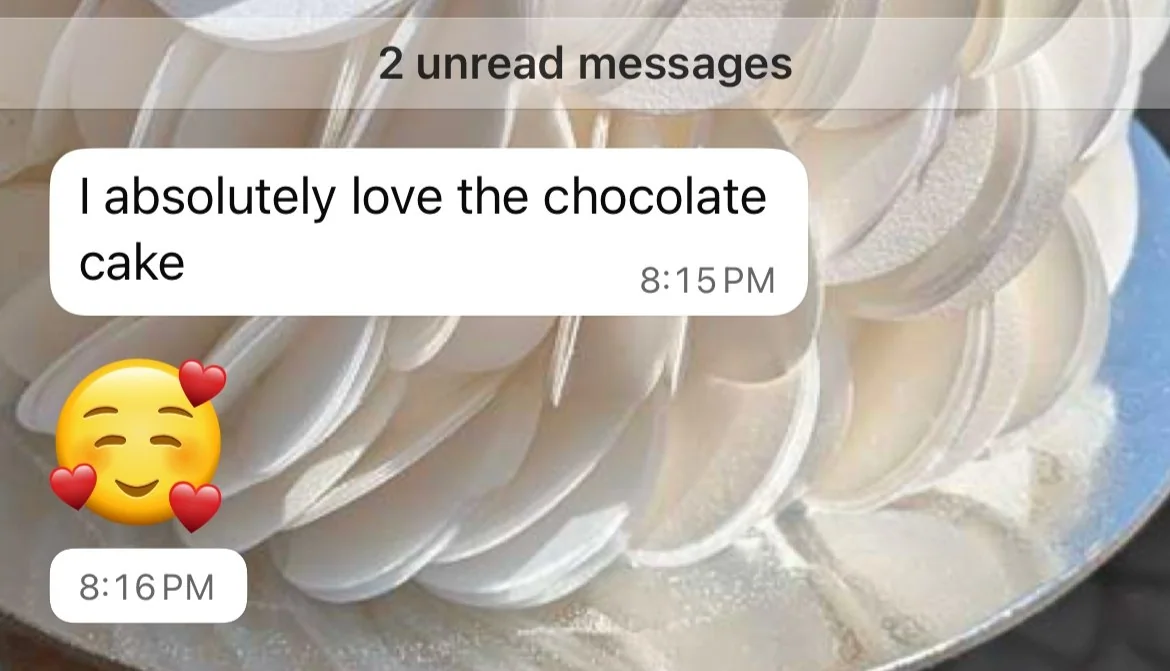 Customer message saying they absolutely love the chocolate cake